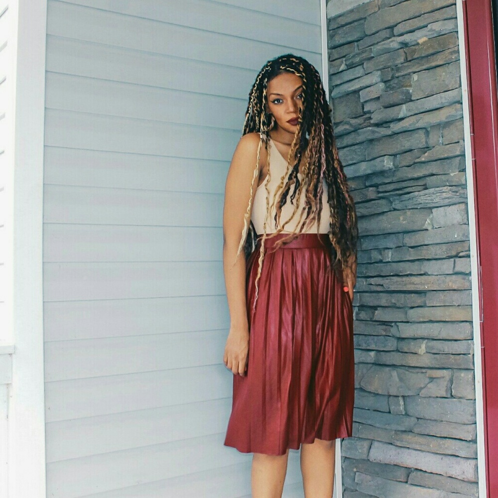 Pleated faux leather midi skirt